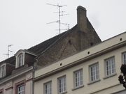 Sur cette photo, on reconnait le pignon du précédent immeuble. Seul vestige encore visible de l'édifice du début du siècle dernier.