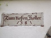 "Zum tiefen Keller" : parchemin en trompe-l’œil signé "Wuest"