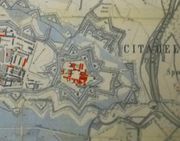 détail du plan de 1871 indiquant en rouge les bâtiments détruits.